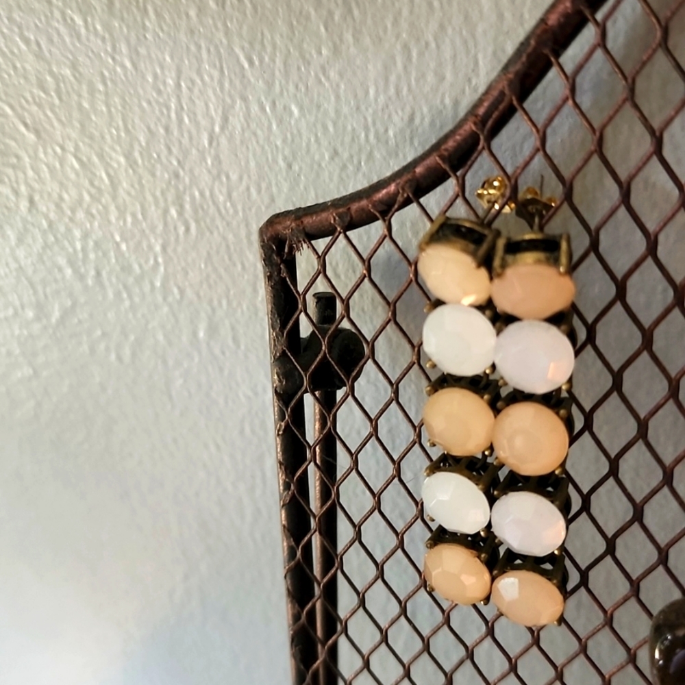 White and peach jeweled earrings